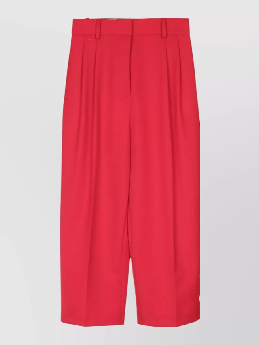 Elisabetta Franchi High-rise tailored trousers — The high-waisted wide-leg trouser in matching vibrant red creates a modern, monochrome Elisabetta Franchi power suit that keeps the silhouette sharp yet fluid for business-to-dinner dressing.