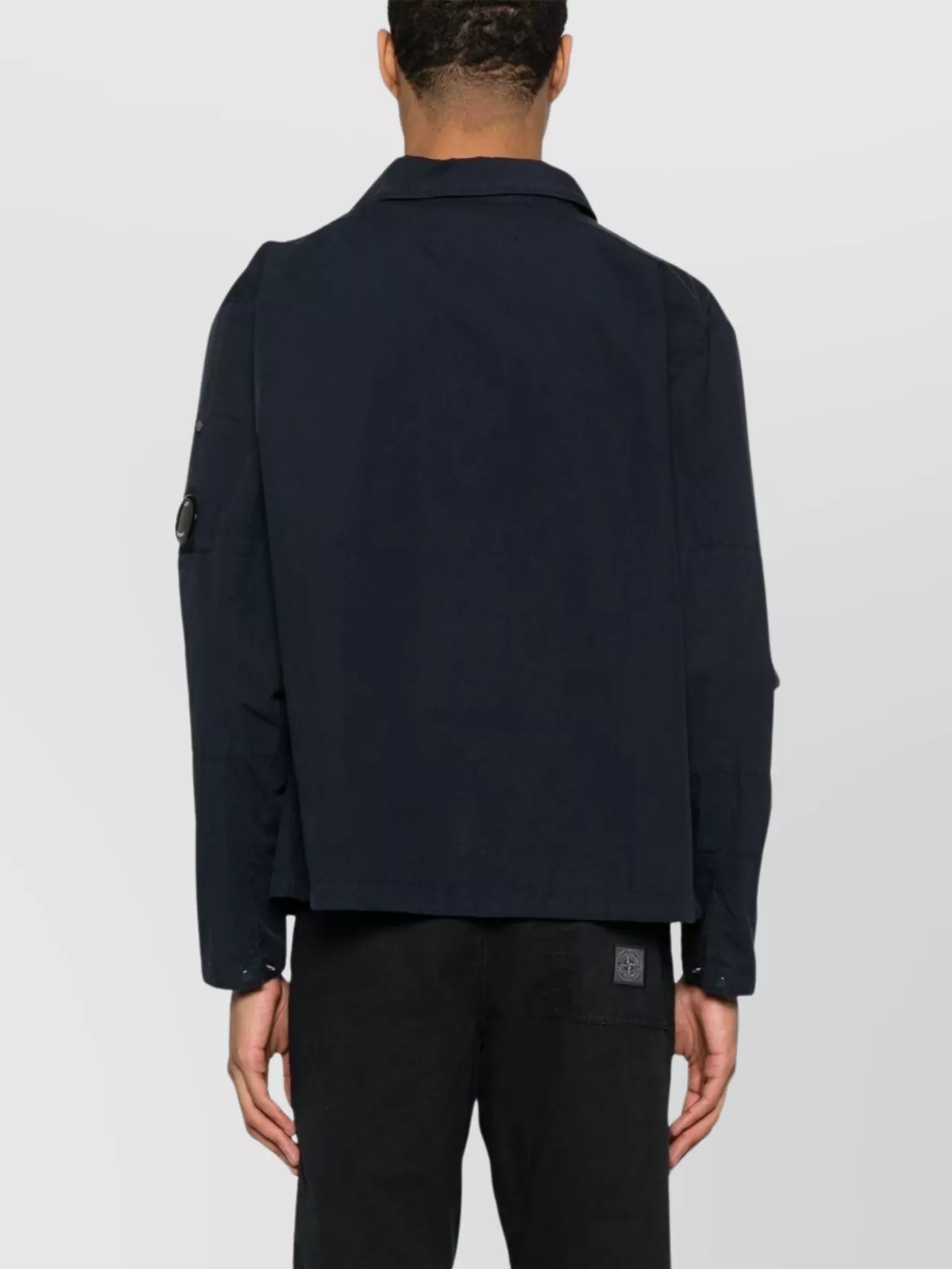 C.p. Company Blue Jacket With Classic Collar And Logo Patch On The Sleeve In Cotton Man