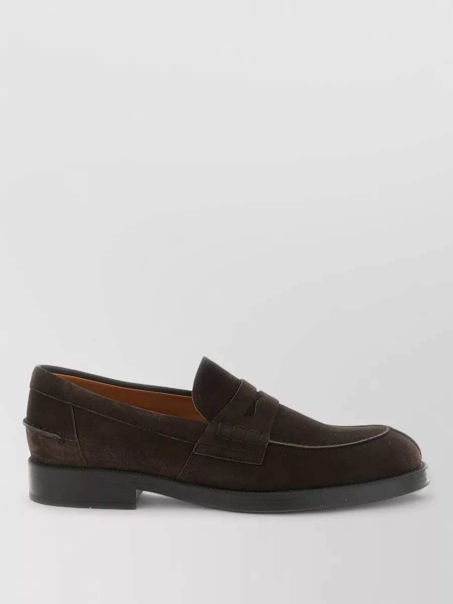 Tod's Suede penny loafers — Tod’s dark brown suede penny loafers harmonise with the knit’s understated polish and the charcoal cords, giving a classic preppy finish that works for city days and casual dinners.