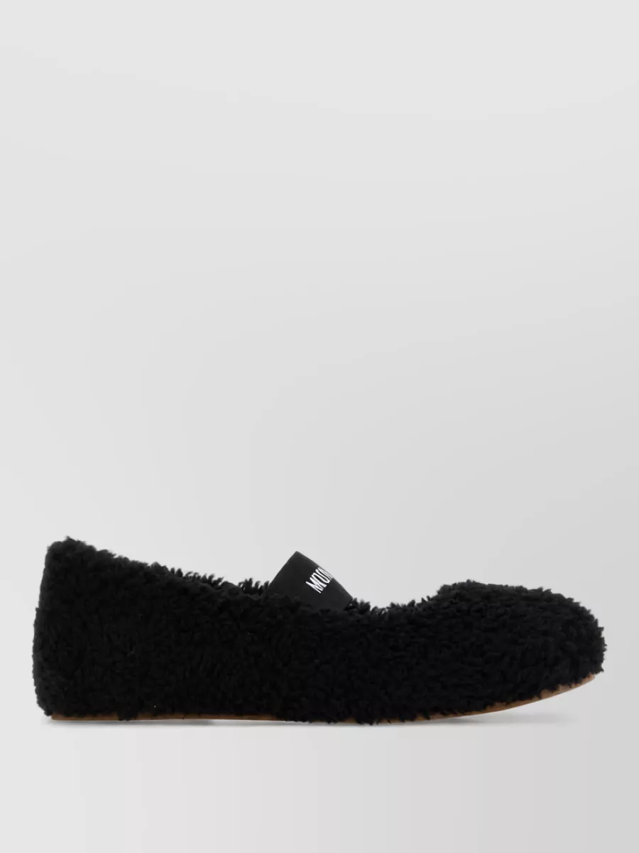 Moon Boot shearling slippers