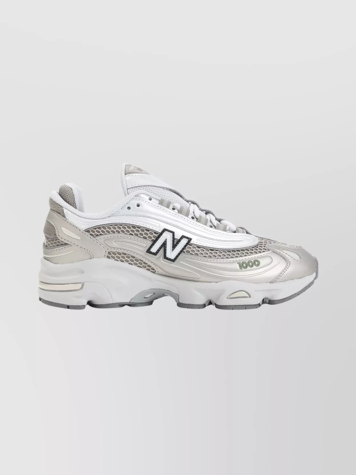 New Balance Contemporary Sneakers Featuring Mesh Panels And Reflective Accents
