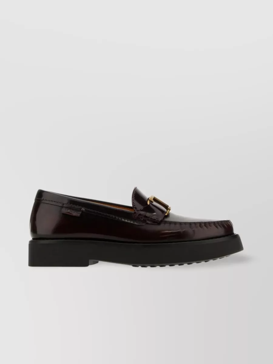 Shop Tod's Vamp Detail Chunky Sole Loafers In Black