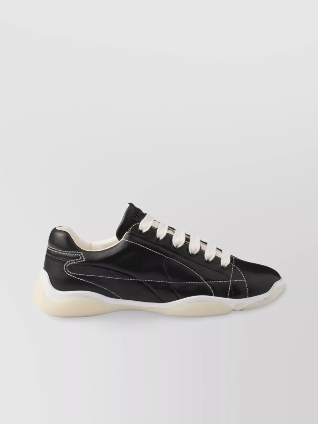 Prada Handcrafted Leather Sneakers Geometric Stitching In Black