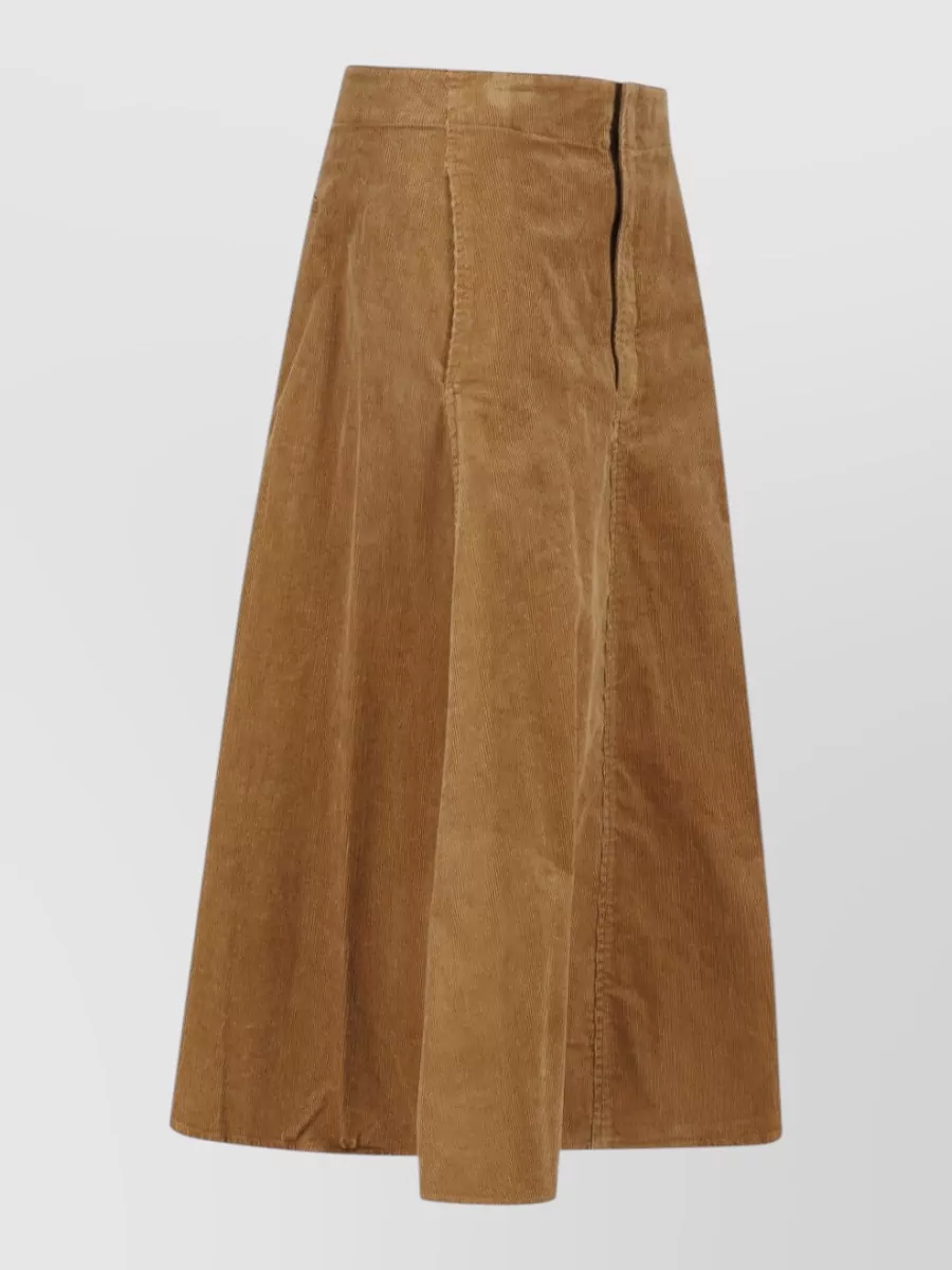 Polo Ralph Lauren Corduroy a-line skirt — The camel corduroy A-line midi balances the cropped burgundy turtleneck with a high waist and soft volume, staying firmly in the preppy quiet-luxury lane for cool weather.