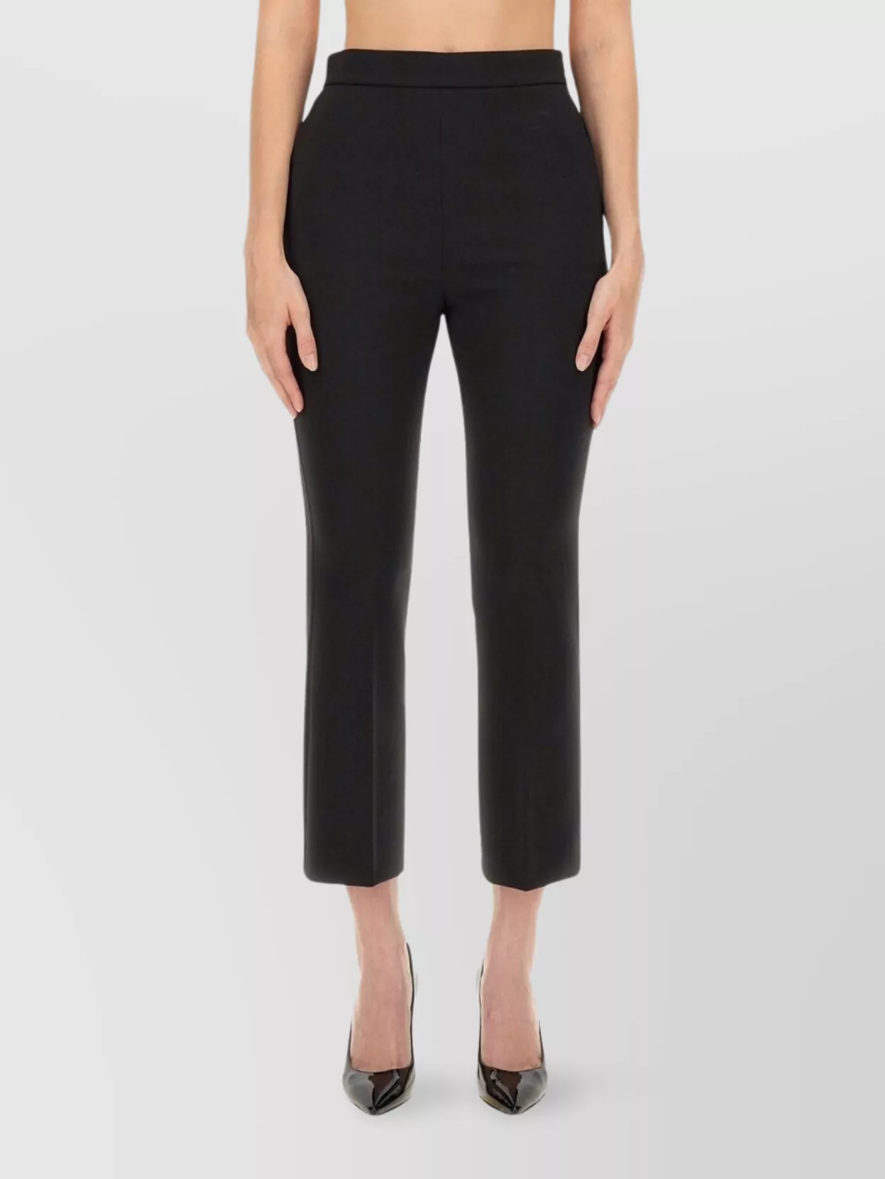 Max Mara Cropped trousers — The high-waisted black wide-leg trouser gives a long, tailored column that balances the cropped lilac jacket and keeps the mood formal, minimal and quietly luxurious.