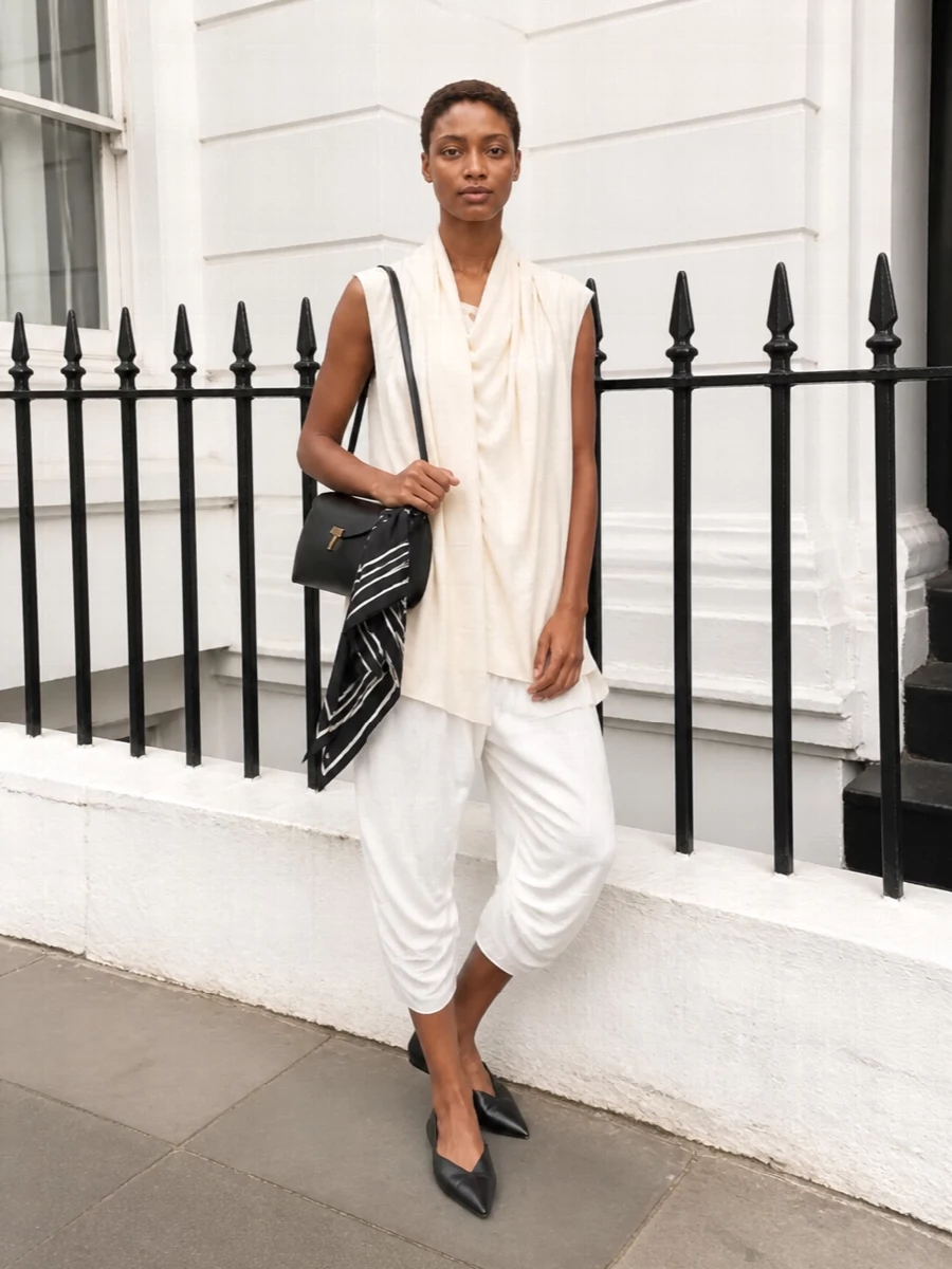Toteme draped white trouser cream tunic outfit