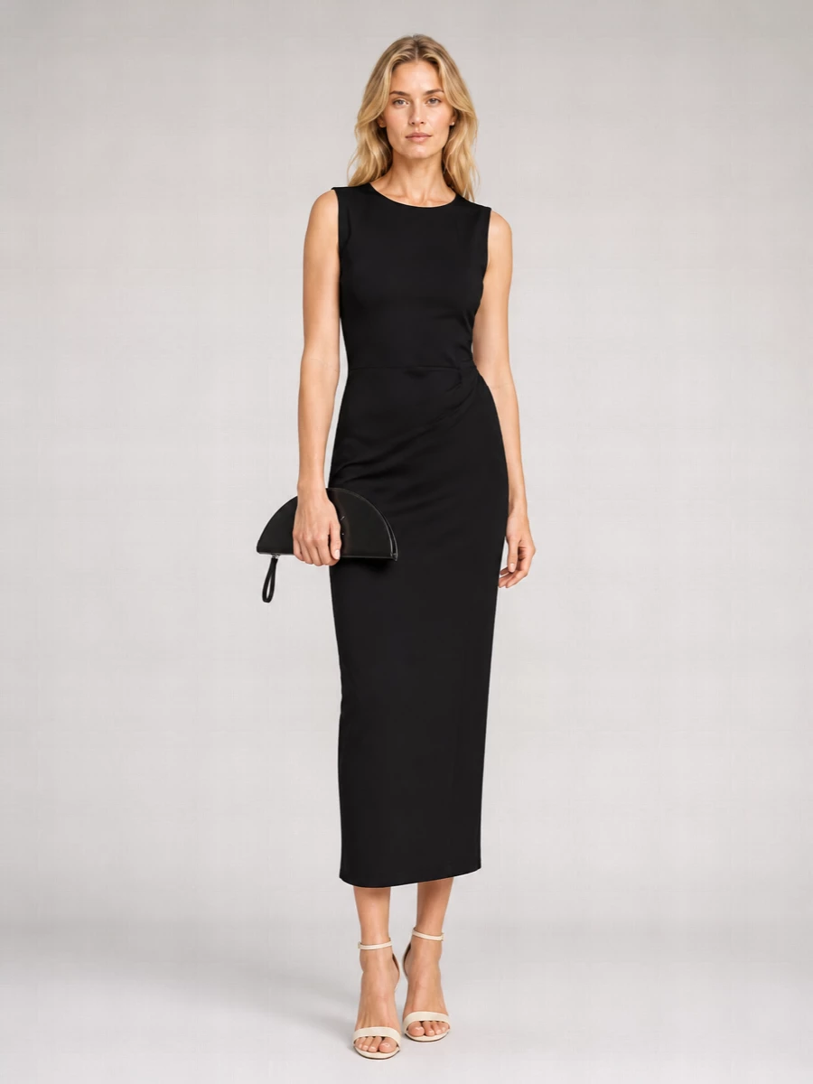 This is a quiet black-tie alternative built around precise lines and near-invisible branding. The sculpted Vivienne Westwood midi, cream ankle-strap heel and Margiela half-moon clutch echo the Bottega cardholder’s refined restraint, relying on cut and texture instead of ornament. It reads as modern, confident evening dressing that slips from gallery to late dinner without needing a change.