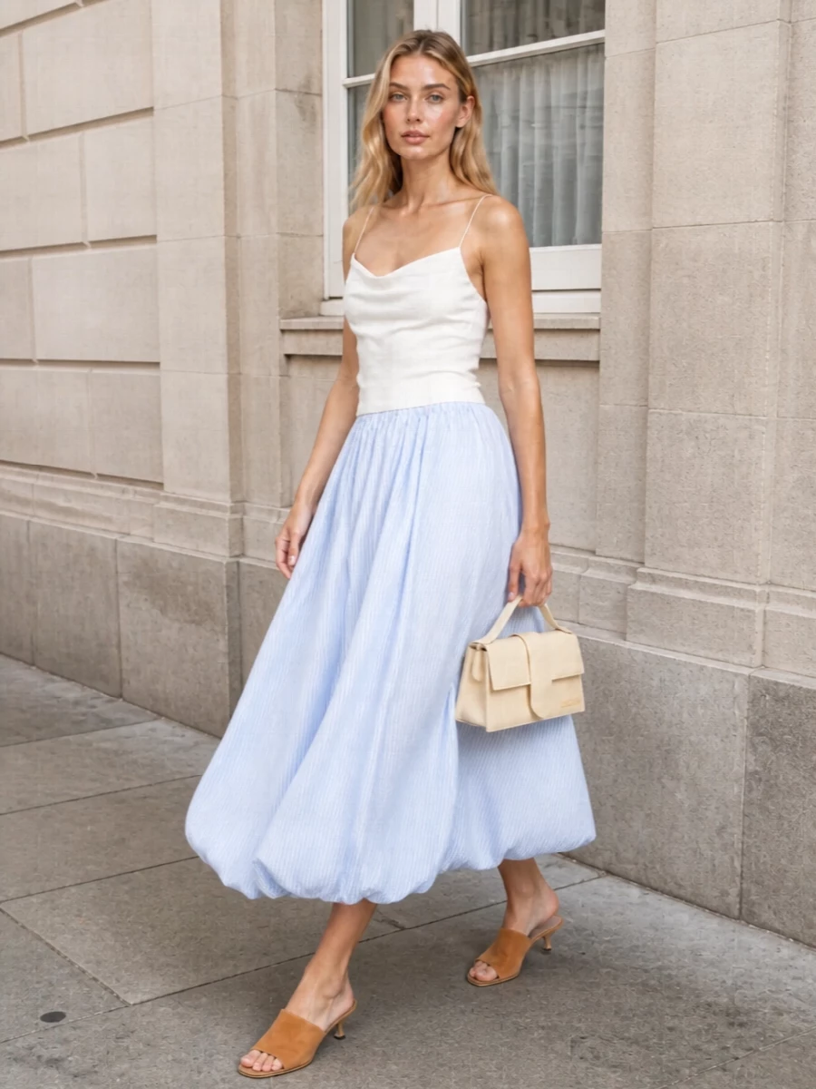 Jacquemus pale blue skirt white camisole outfit