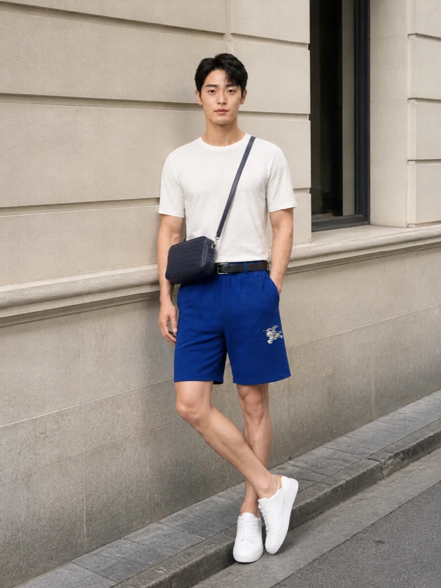 Burberry cobalt shorts white tee sneakers outfit