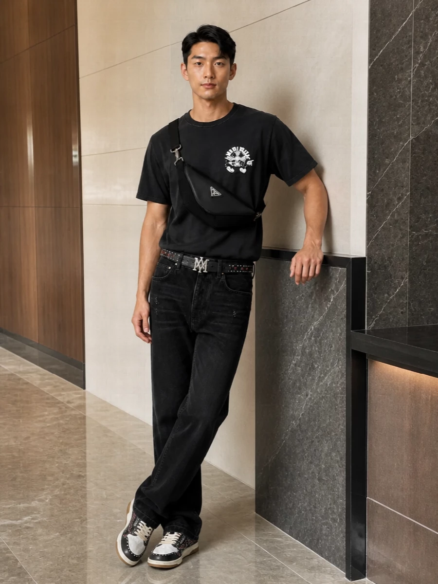 Amiri black tee black jeans studded sneakers