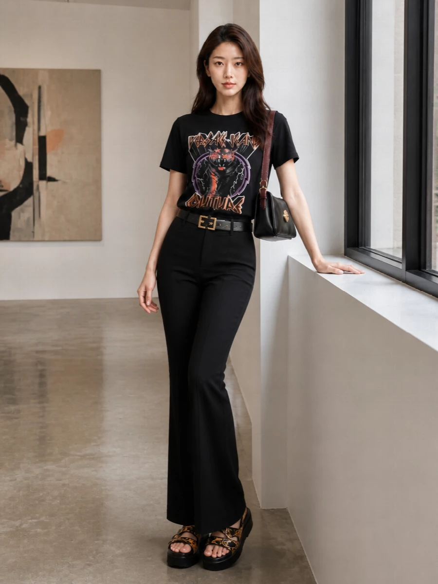 Versace graphic tee black flared trousers outfit