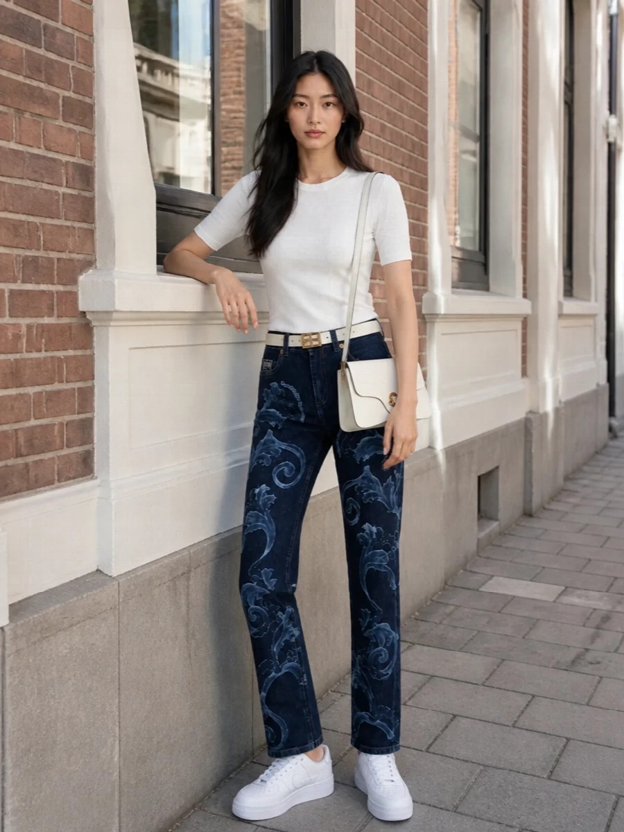 Versace white logo tee embroidered jeans outfit