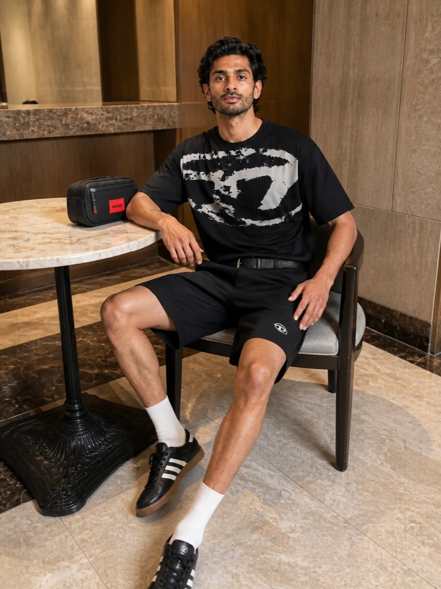 Diesel black shorts graphic tee adidas sneakers