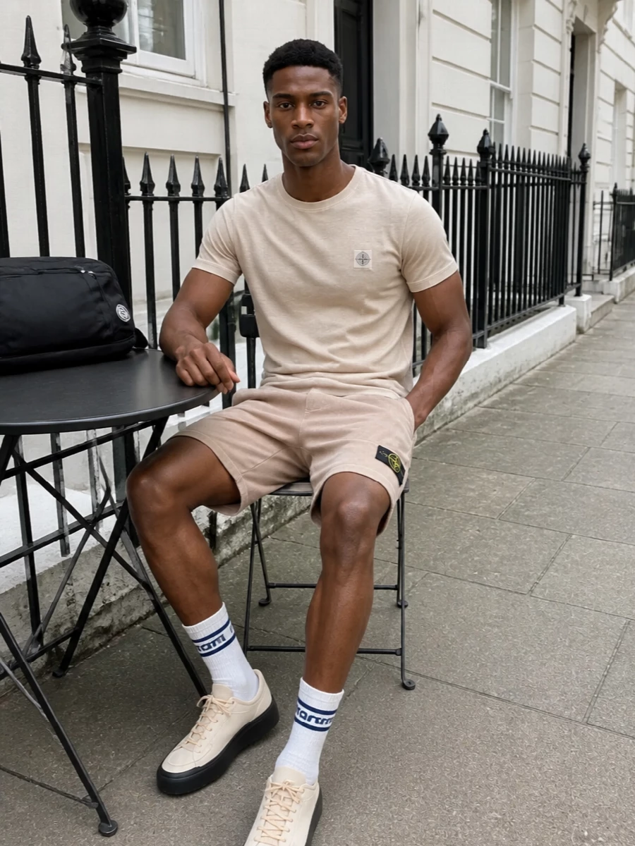 Stone island sand shorts neutral sneakers outfit