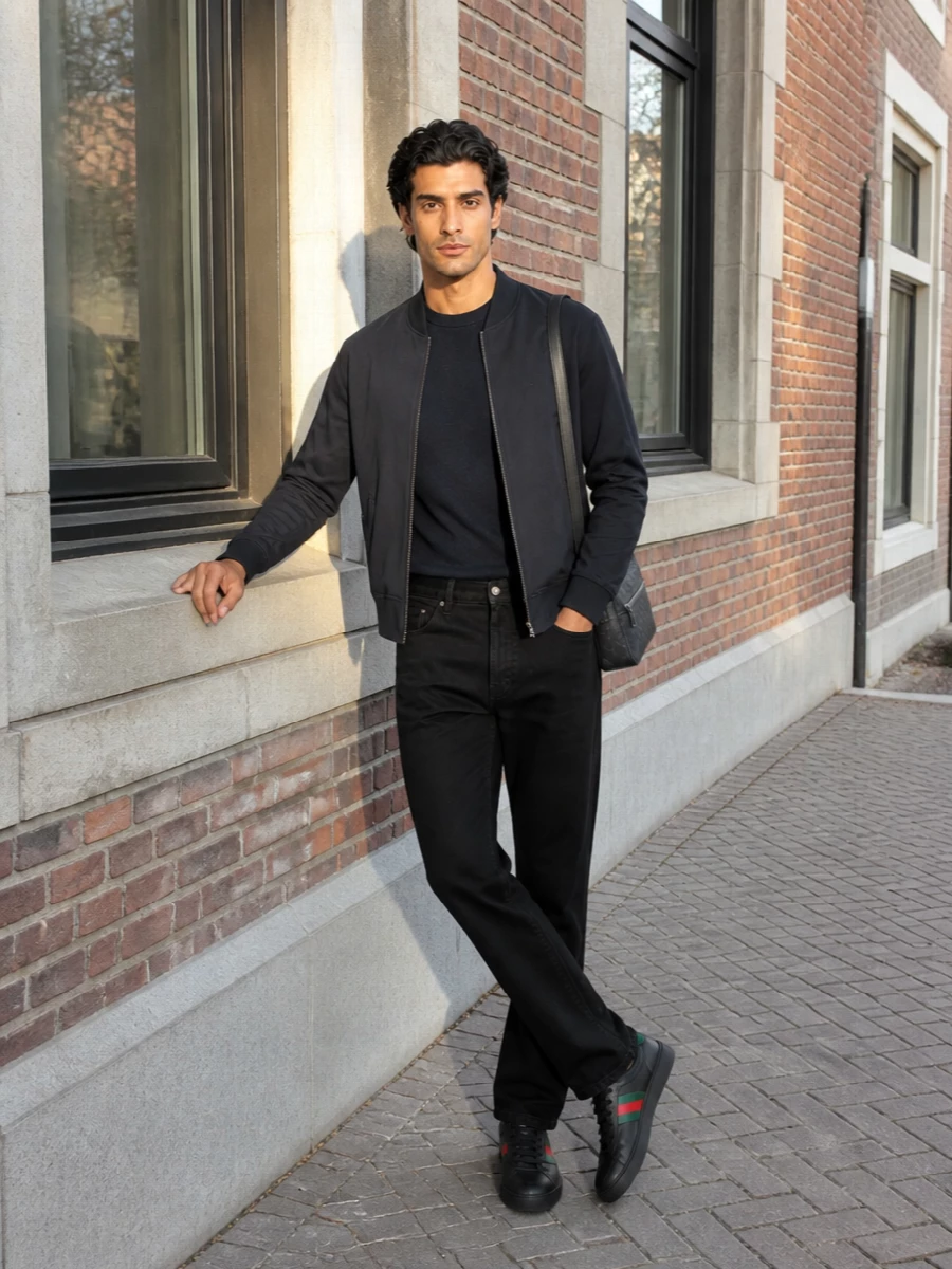 Gucci navy bomber black jeans sneakers outfit