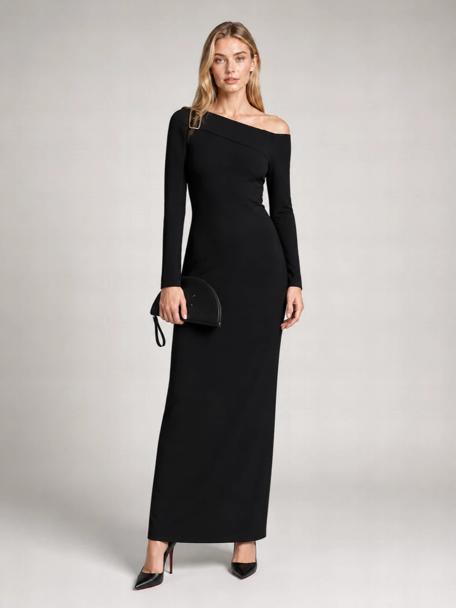 This is a pure black-tie city moment built around line and restraint, with the Courrèges one-shoulder maxi echoing the Louboutin pump’s sharp geometry. The choice of a dress over separates keeps the silhouette uninterrupted and elongated, so the focus stays on cut, posture and that precise, confident heel. Margiela’s half-moon clutch adds a single sculptural accent without breaking the quiet-luxury mood.