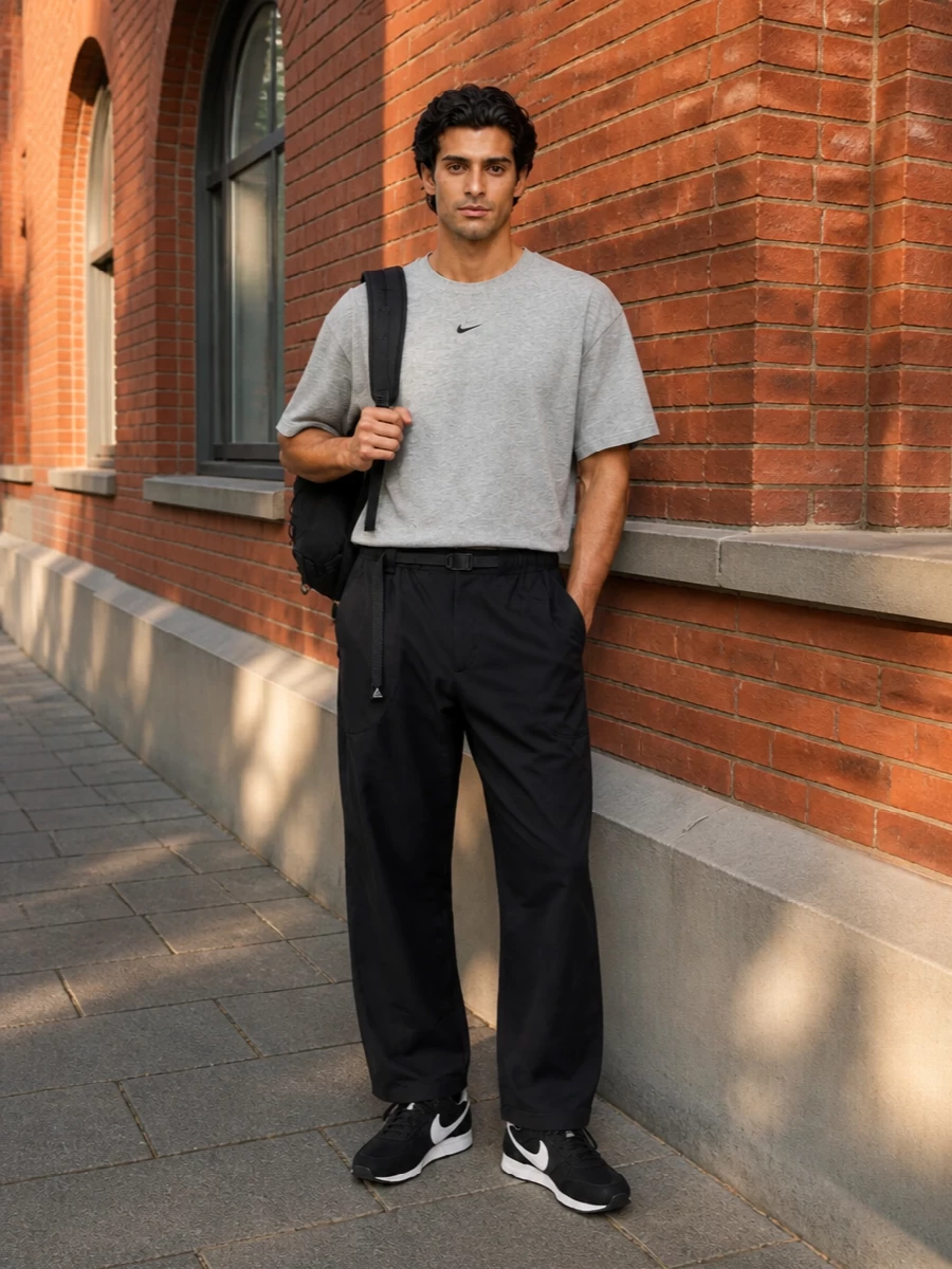 Nike grey tee black track pants retro sneakers