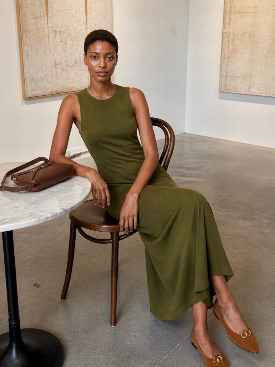 I chose the dress route so the Fendi olive midi can be the single, clean anchor to your Miu Miu chocolate baguette. Together with the cognac pointed flats, it becomes a quietly luxurious, tonal story of warm browns and olive that feels refined for city days and dinners without ever reading over-styled.
