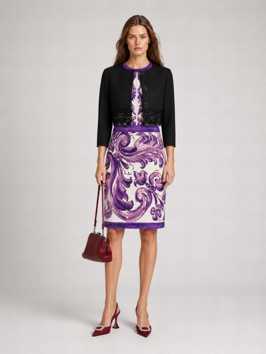 Dolce&Gabbana’s baroque purple dress stays firmly center stage, grounded with deep burgundy Amina Muaddi slingbacks that mirror its drama without fighting the print. A sculptural wine clutch from The Attico ties the darker tones together, keeping the palette rich and nocturnal for serious cocktail hours. The result is sharp, romantic and unapologetically evening-focused with just a trace of y2k shimmer in the accessories.