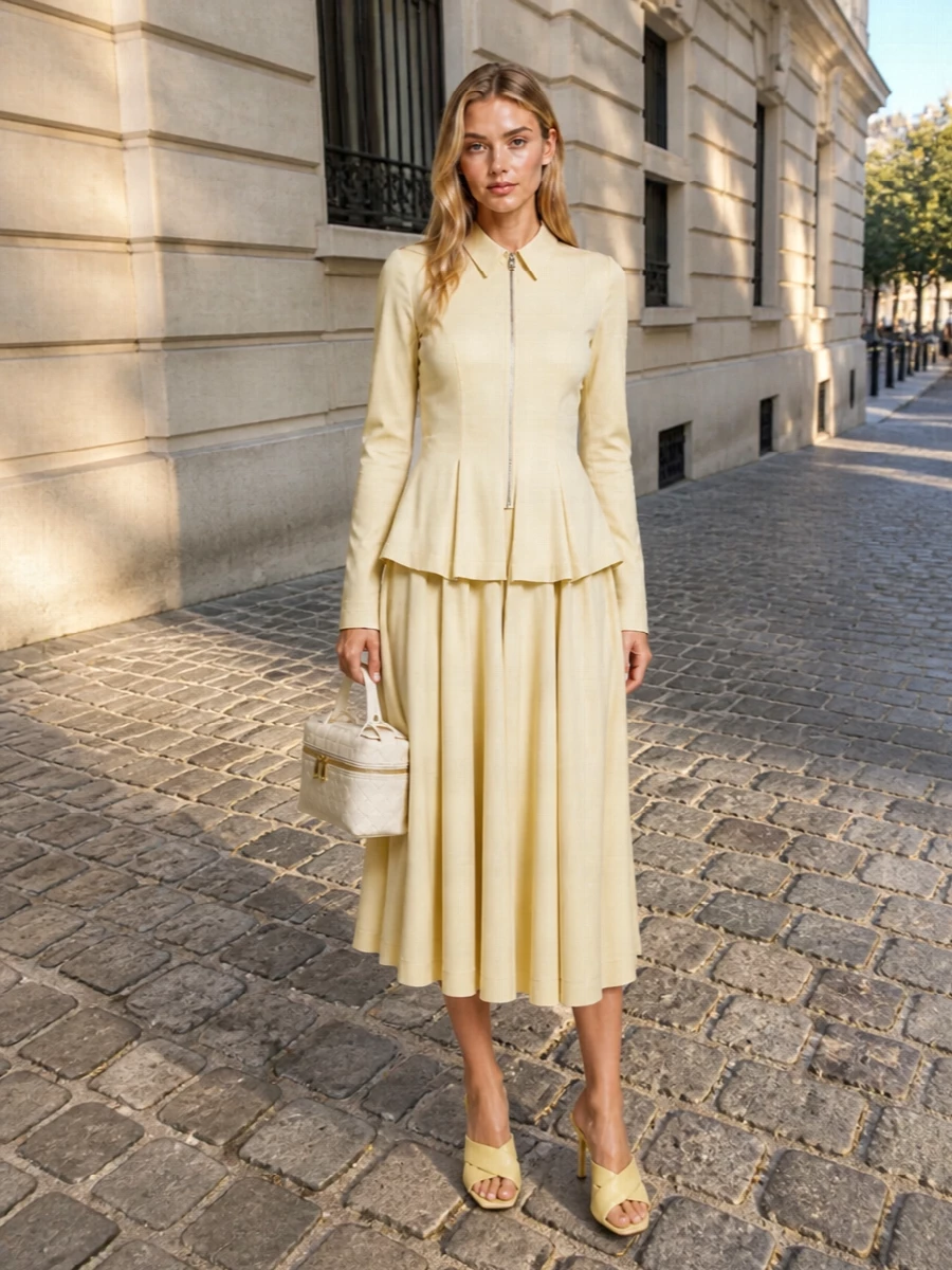 I’m taking the dress route here, letting the buttercream Bottega peplum midi mirror the sandals’ soft yellow and their sculpted, architectural mood. The result is a monochrome, quietly structured outfit that reads refined enough for summer dinners or city events without feeling fussy. An ivory intrecciato shoulder bag keeps everything in the same calm, minimal register while adding subtle texture.