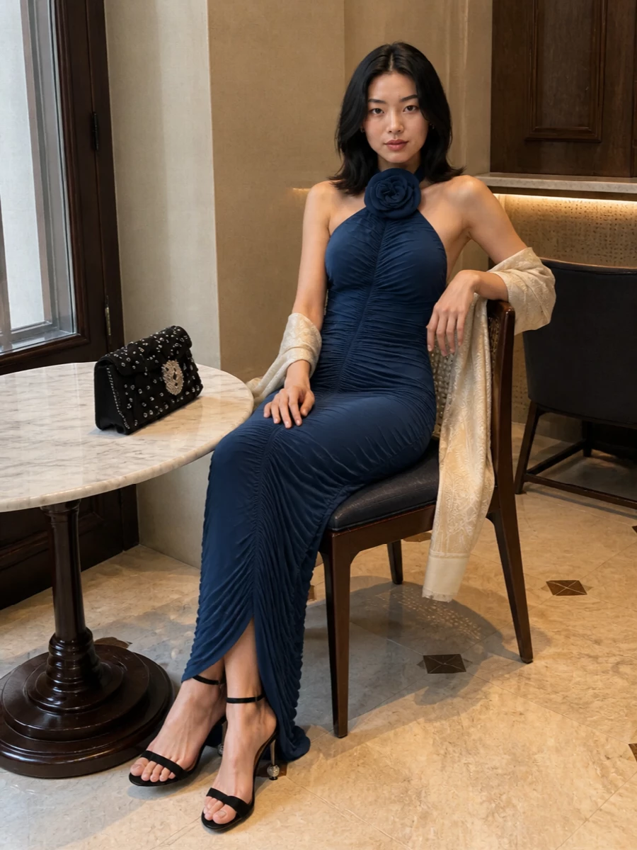 Magda butrym blue gown roger vivier clutch