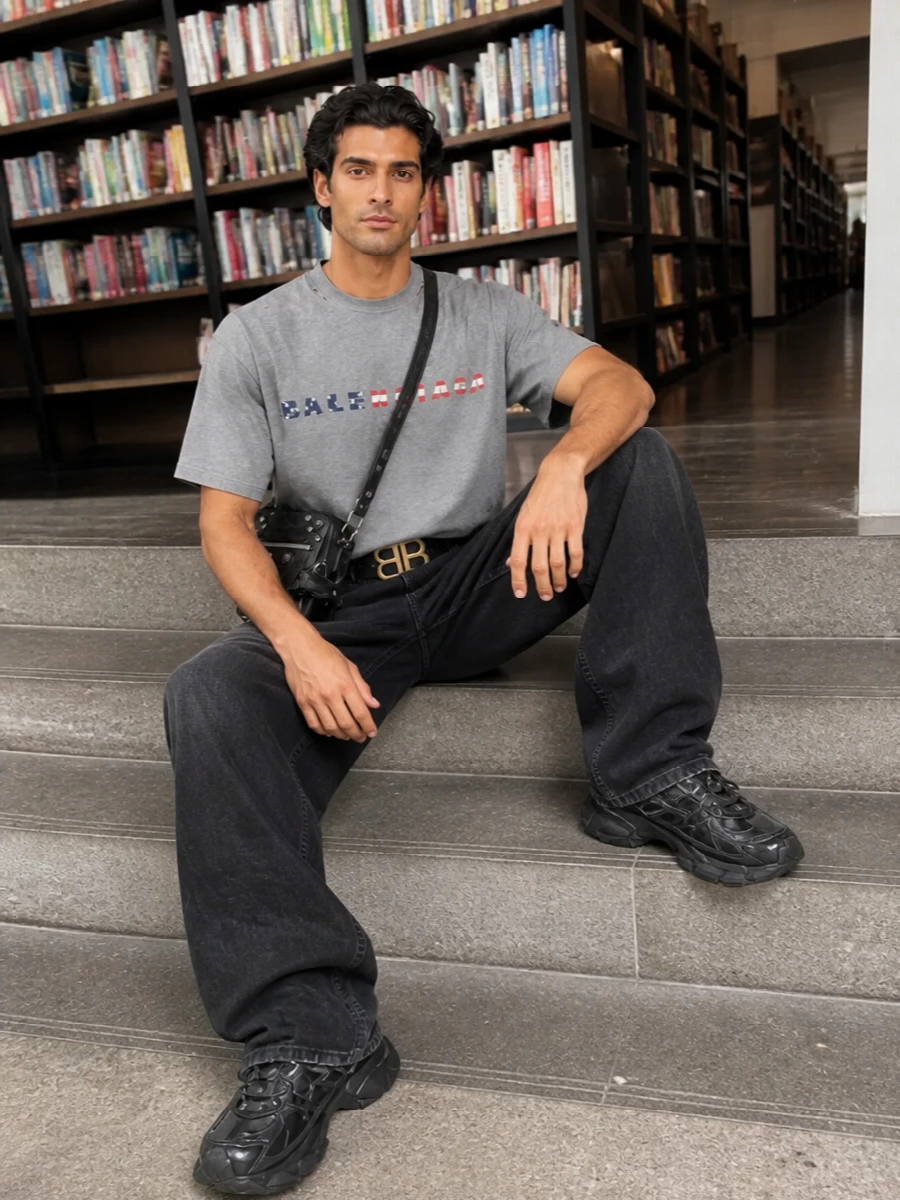 Balenciaga grey logo tee loose black jeans outfit