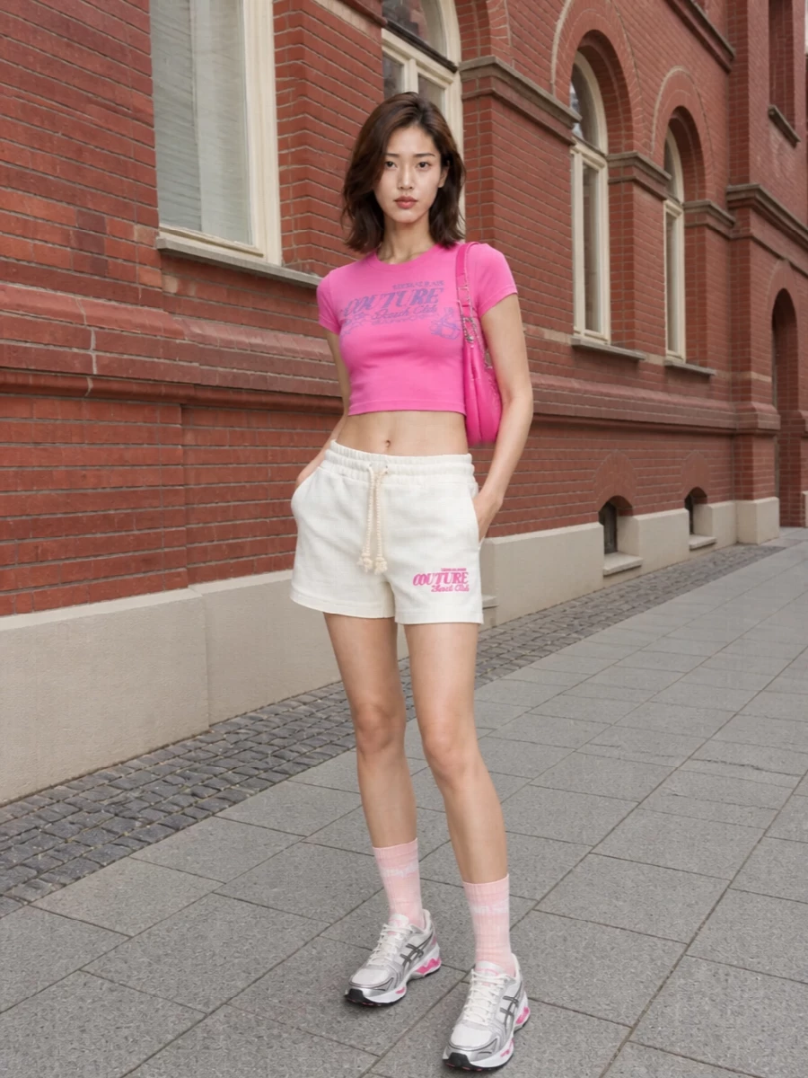 Versace pink crop top beach shorts sneakers
