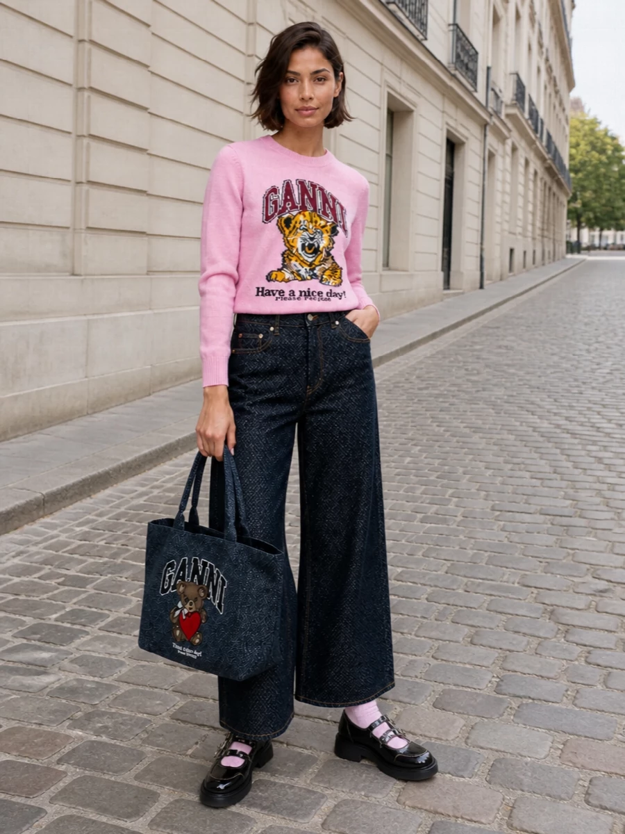 Ganni pink tiger sweater wide leg jeans outfit