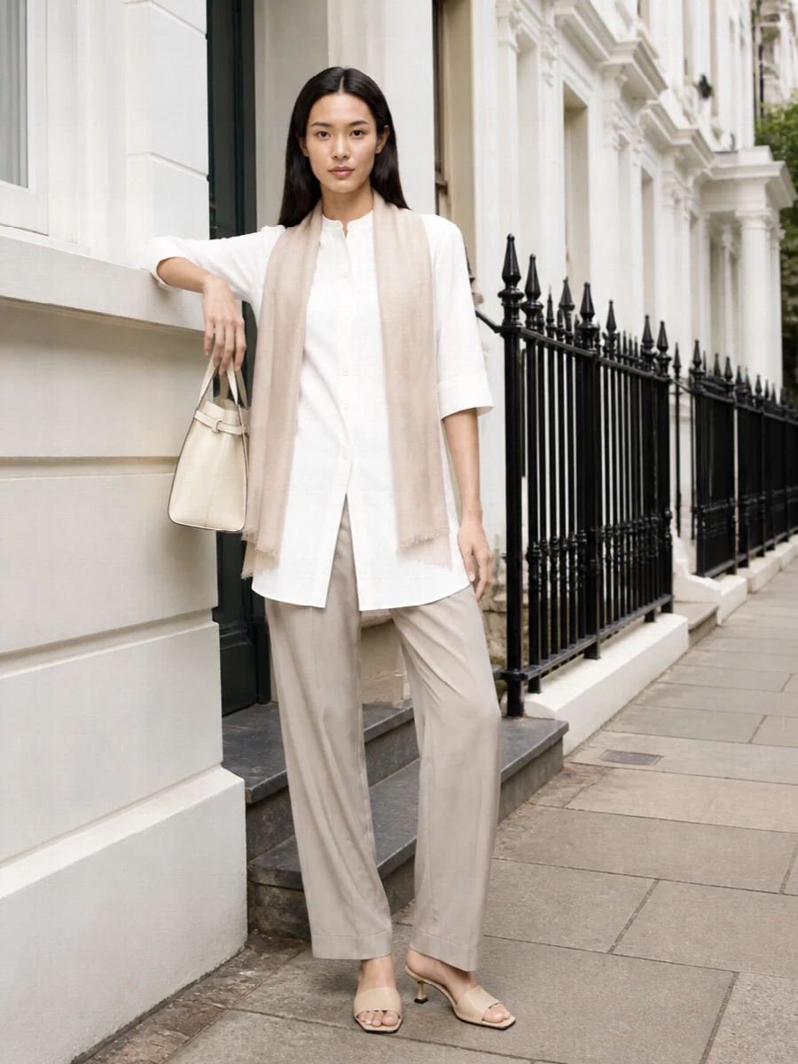 The row white shirt stone trouser outfit