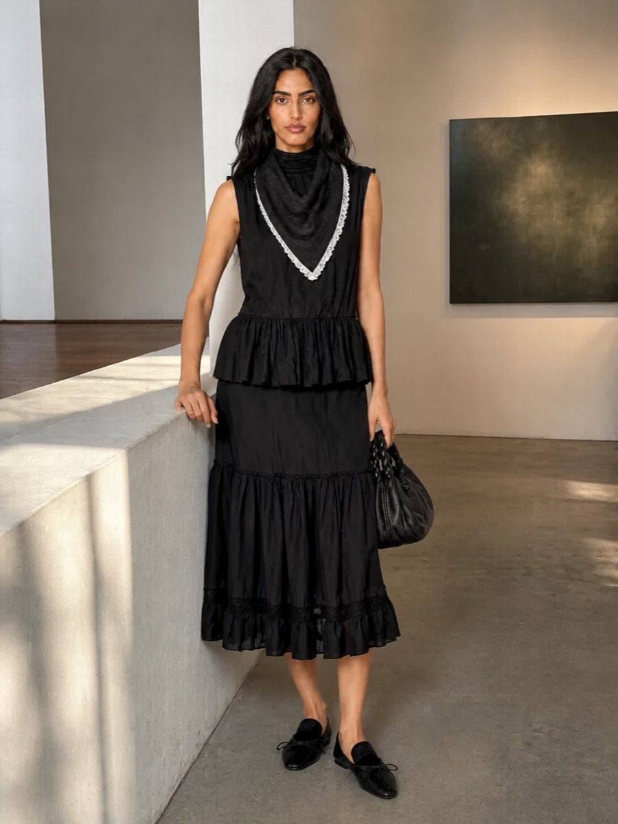 Gimaguas black ruffle tunic ganni midi skirt outfit