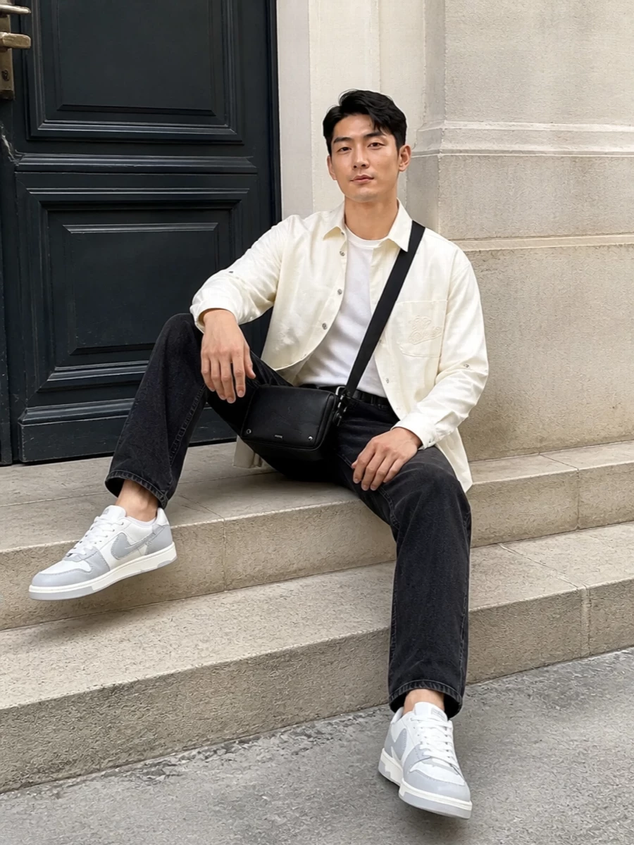 Off white shirt washed black jeans streetwear outfit