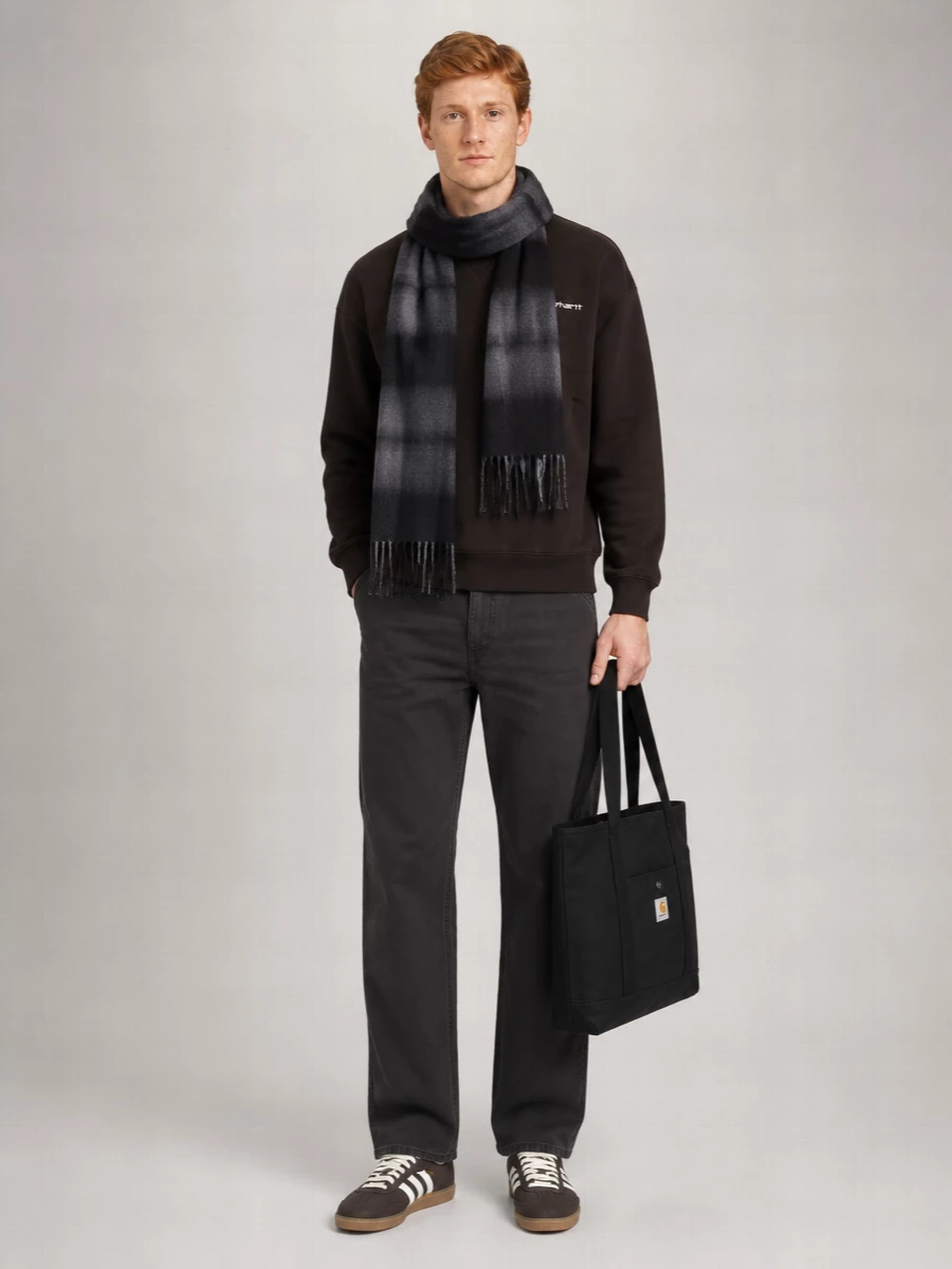 Chocolate brown and washed charcoal sit together for a muted, utility-driven street mix that feels easy but thought through. Terrace-inspired brown sneakers pick up the top’s warmth, while the structured black tote and smoky scarf keep the mood grounded and city-ready.