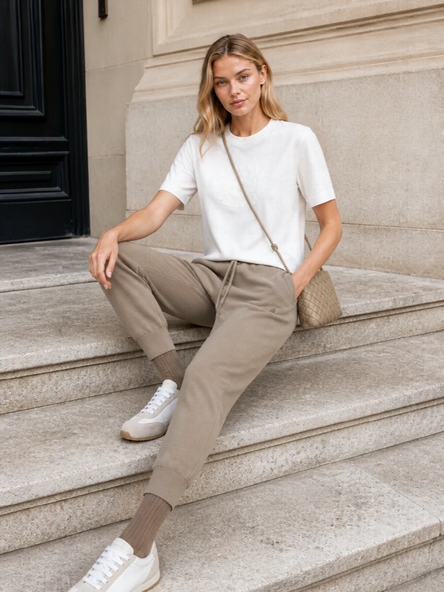 Burberry track pants outfit taupe prada sneakers