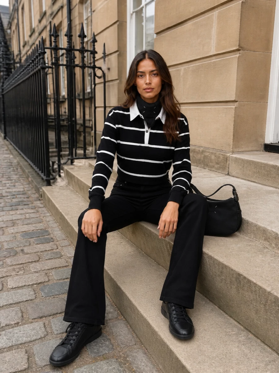 Amiri striped rugby sweater black flared jeans