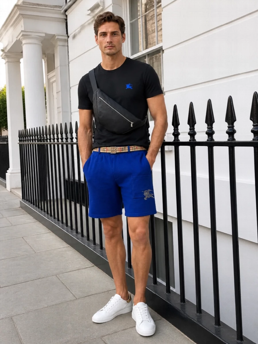 Burberry black tee cobalt shorts white sneakers