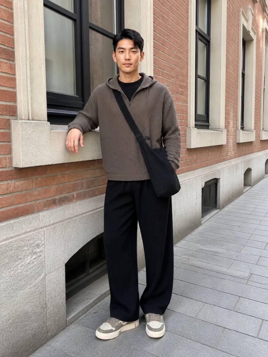 Homme plisse pleated hoodie black wide leg trousers