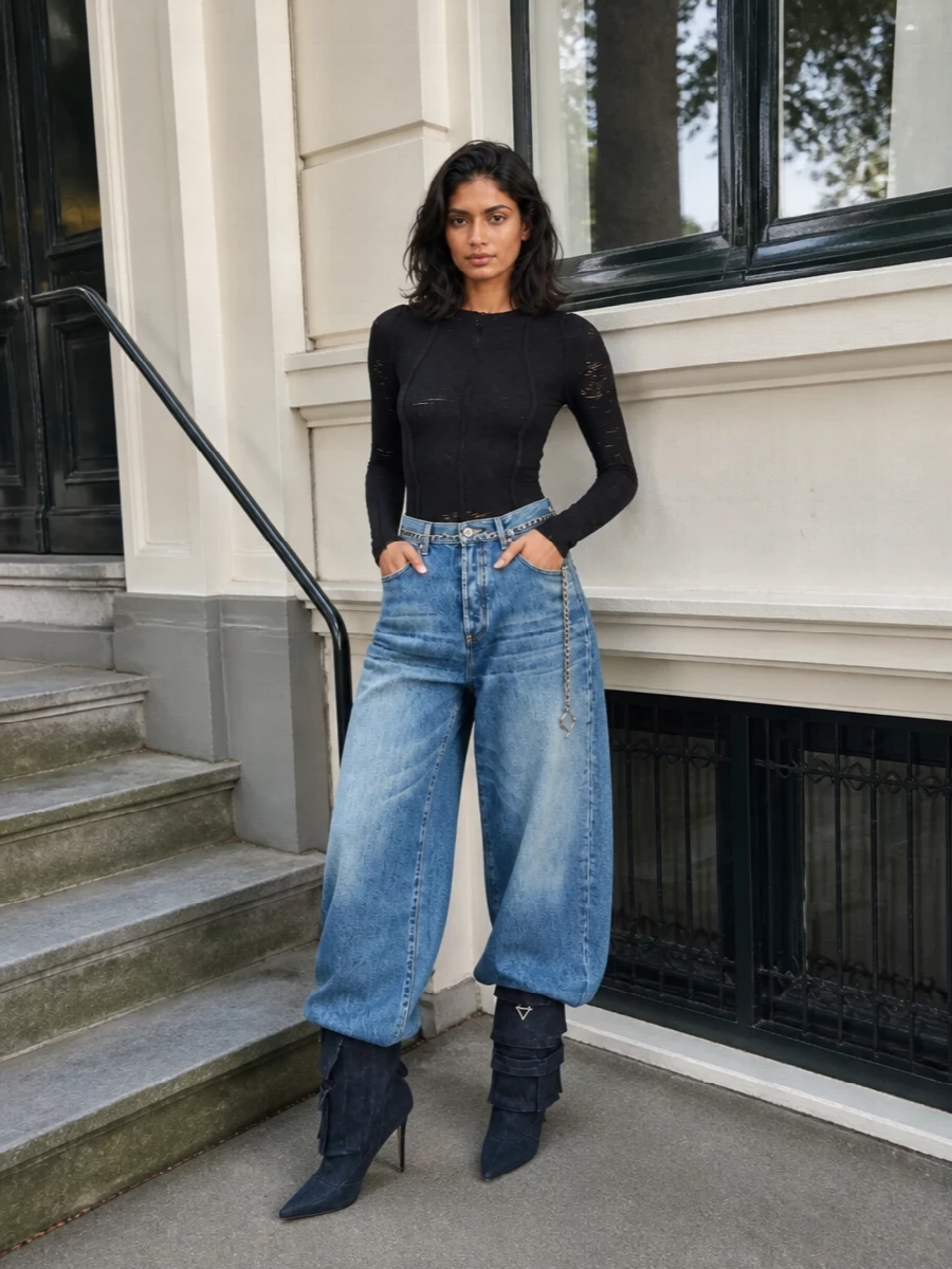 The attico wide leg jeans black knit denim boots