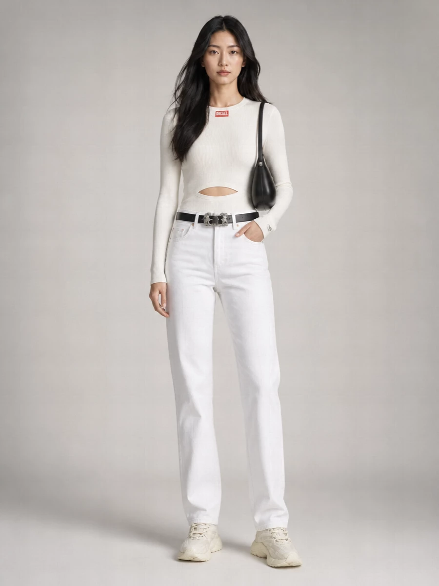 Soft-white straight denim and the ivory cut-out knit create a clean, tonal base with just enough edge from Diesel’s logo detailing. Chunky neutral runners keep it grounded and relaxed, while the black belt and sculptural mini bag add focused contrast and city polish. It is an easy off-duty uniform that still feels sharply put together from coffee runs to low-key evenings.
