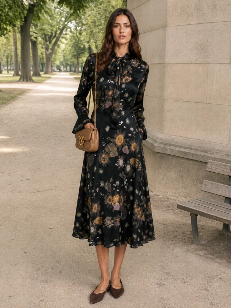 I anchored everything around the floral Semicouture midi rather than separates, because its moody print and high neck echo the Chloé necklace’s romantic boho spirit and gold tones most naturally. Chocolate chain-detailed flats keep the mood relaxed and tactile, while the caramel quilted bag picks up the warm hues so the jewelry feels like a deliberate, glinting accent rather than an afterthought. The result is an easy fall romantic outfit you can wear from late lunch straight through dinner without changing a thing.