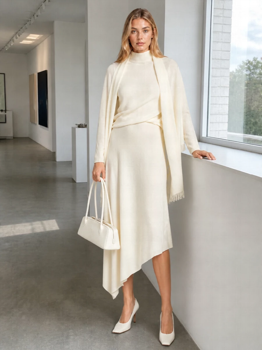 Alaia cream knit dress white heels bag