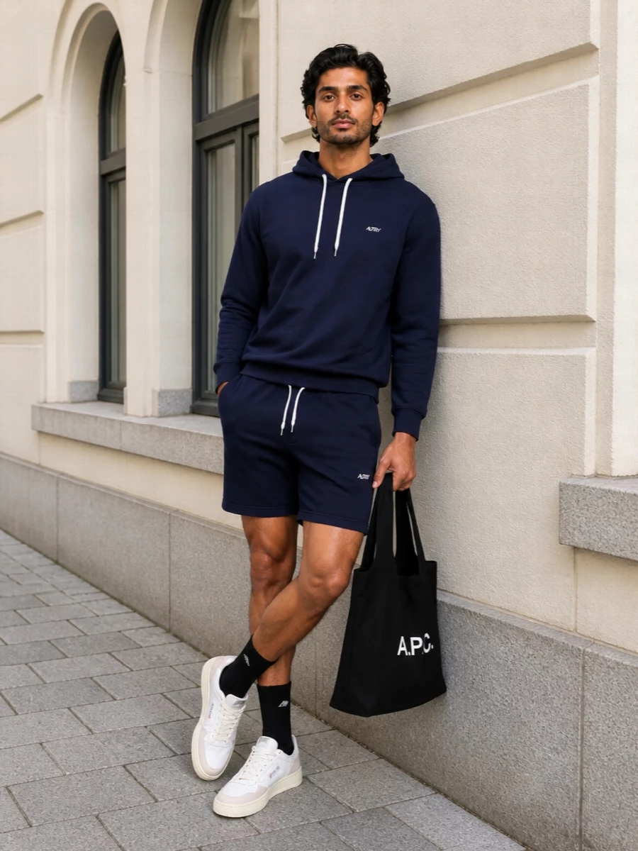 Autry navy hoodie shorts white sneakers outfit