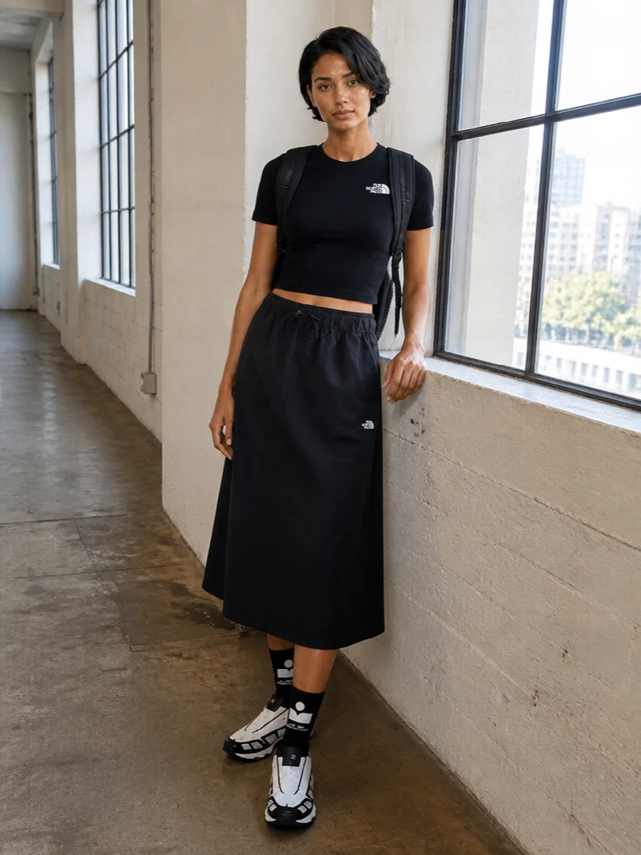 The north face midi skirt cropped tee nike sneakers