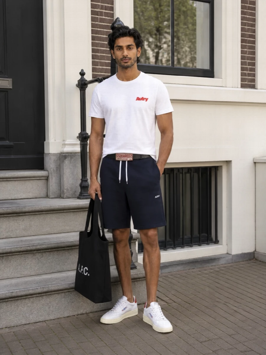 Autry white logo t shirt navy shorts sneakers