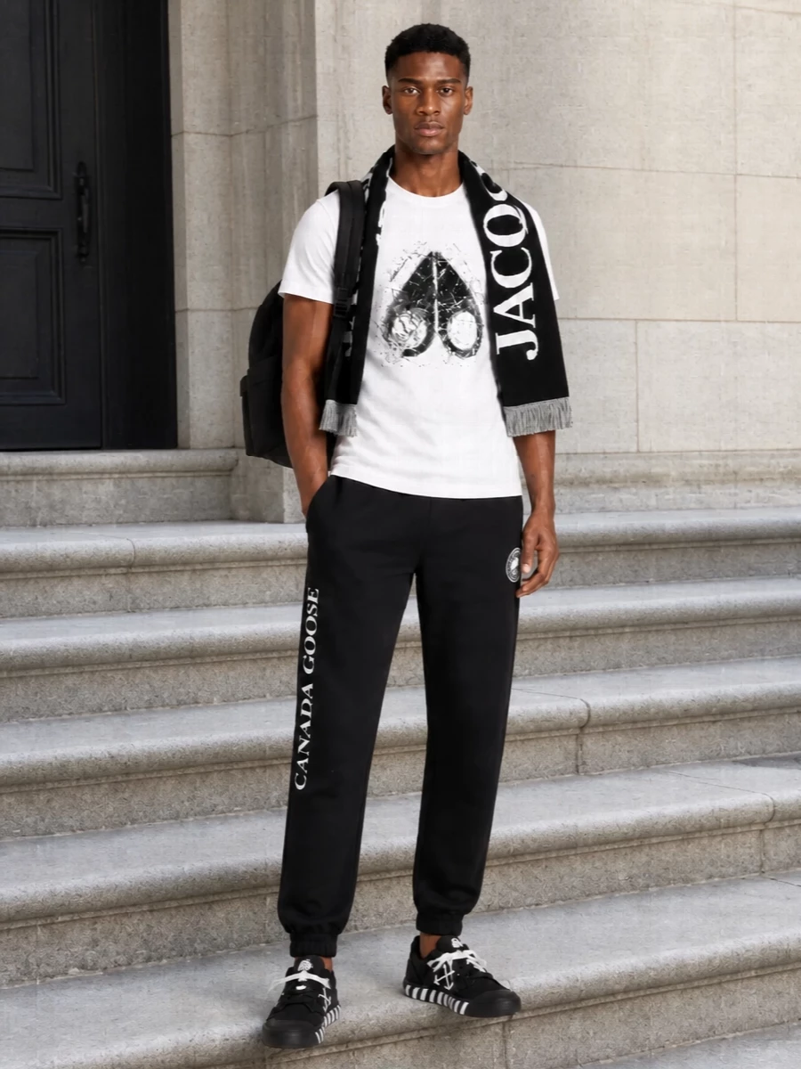 Moose knuckles tee canada goose track pants outfit