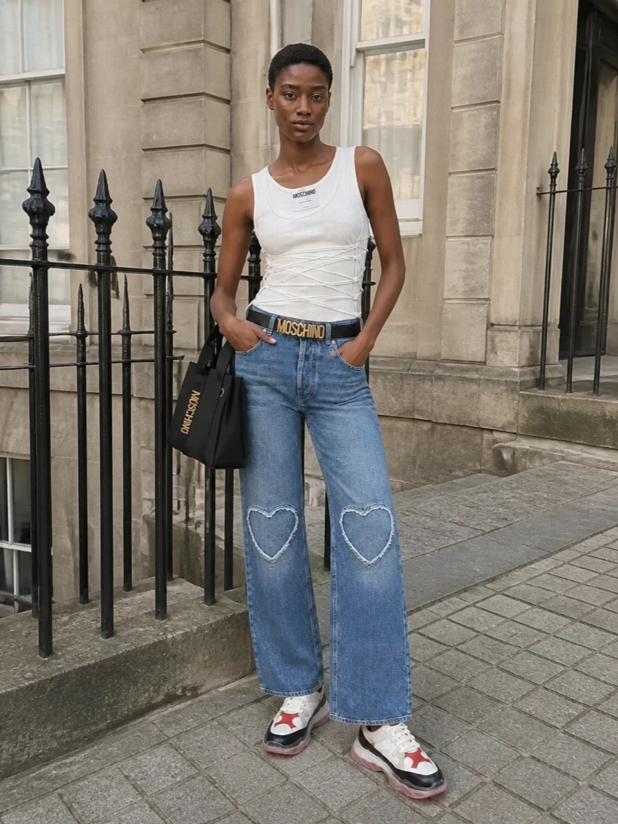 Moschino corset tank heart cut out jeans outfit
