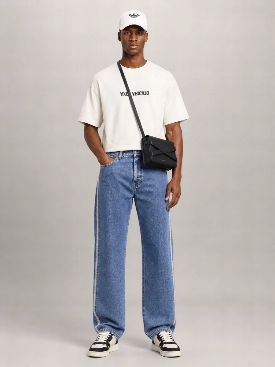 A clean, sport-informed streetwear story built around monochrome contrasts. The boxy off white tee sits neatly over wide-leg Adidas denim, with the side stripes echoing the cap’s athletic energy. Off white and black Axel Arigato sneakers tie everything together, keeping the palette sharp yet relaxed for city days and travel.