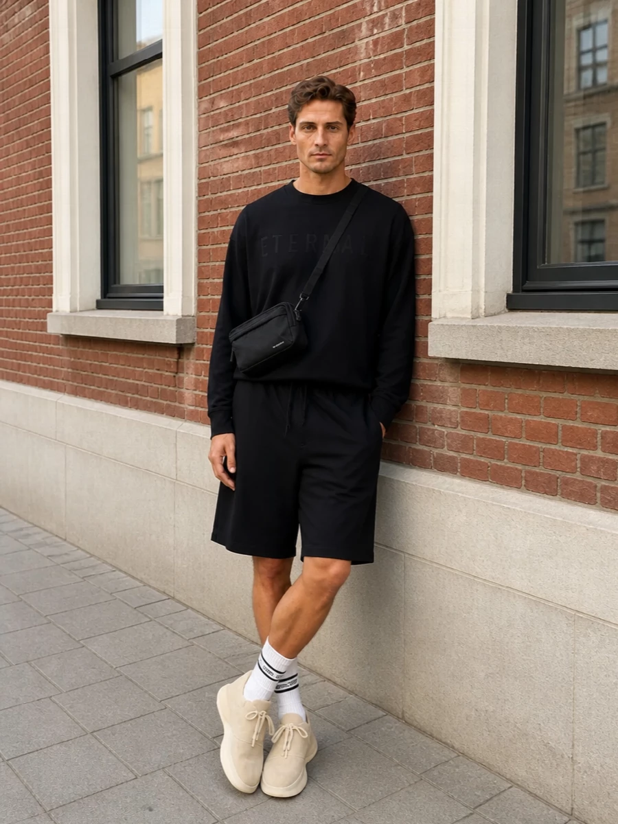Fear of god black shorts outfit beige sneakers