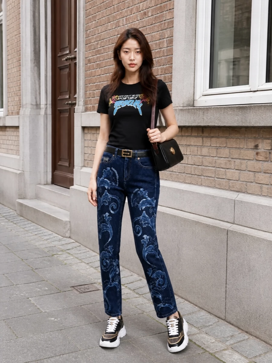 Versace baroque jeans black graphic tee outfit