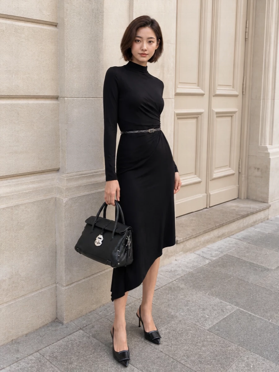 I chose the dress path so the Dries Van Noten snakeskin belt could act as the single, graphic focal against a clean black column, rather than fighting multiple separates and cuts. The Ermanno Firenze asymmetric midi with Roger Vivier slingbacks and a structured Zanellato bag reads as modern eveningwear with a subtle street undercurrent, all about line, texture and that slim flash of reptile at the waist. It is sharp enough for a gallery opening or dark-wood cocktail bar, but still feels quietly effortless to wear.