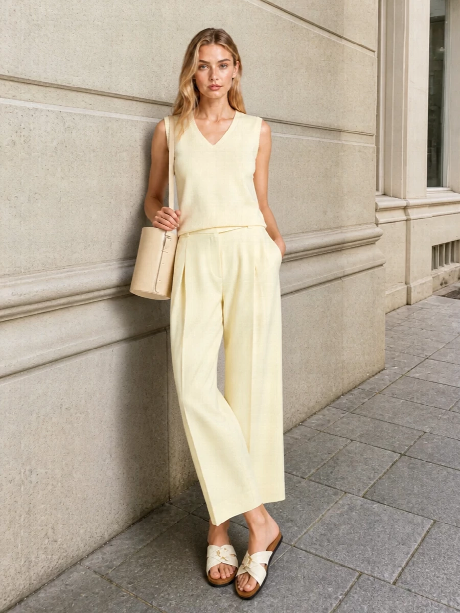 Minimalist knit vest wide leg trousers outfit